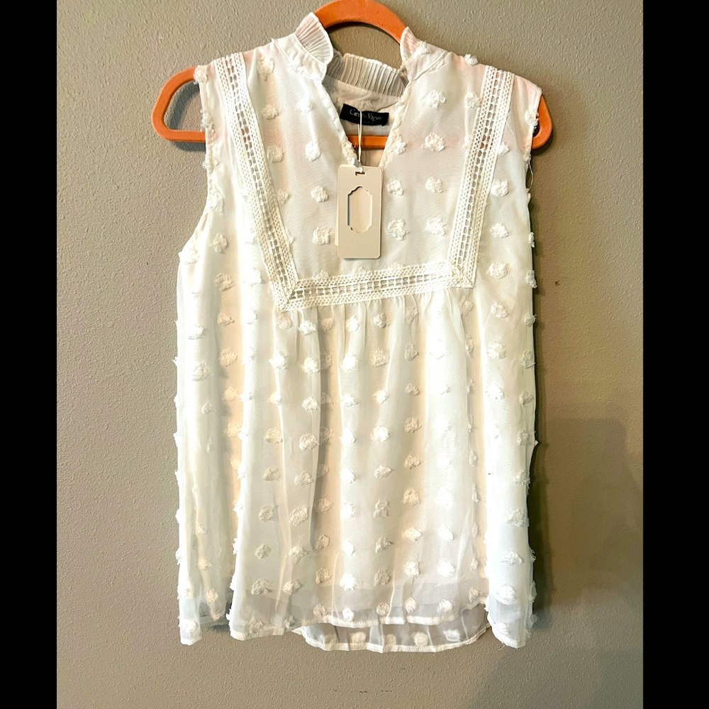 White sleeveless top